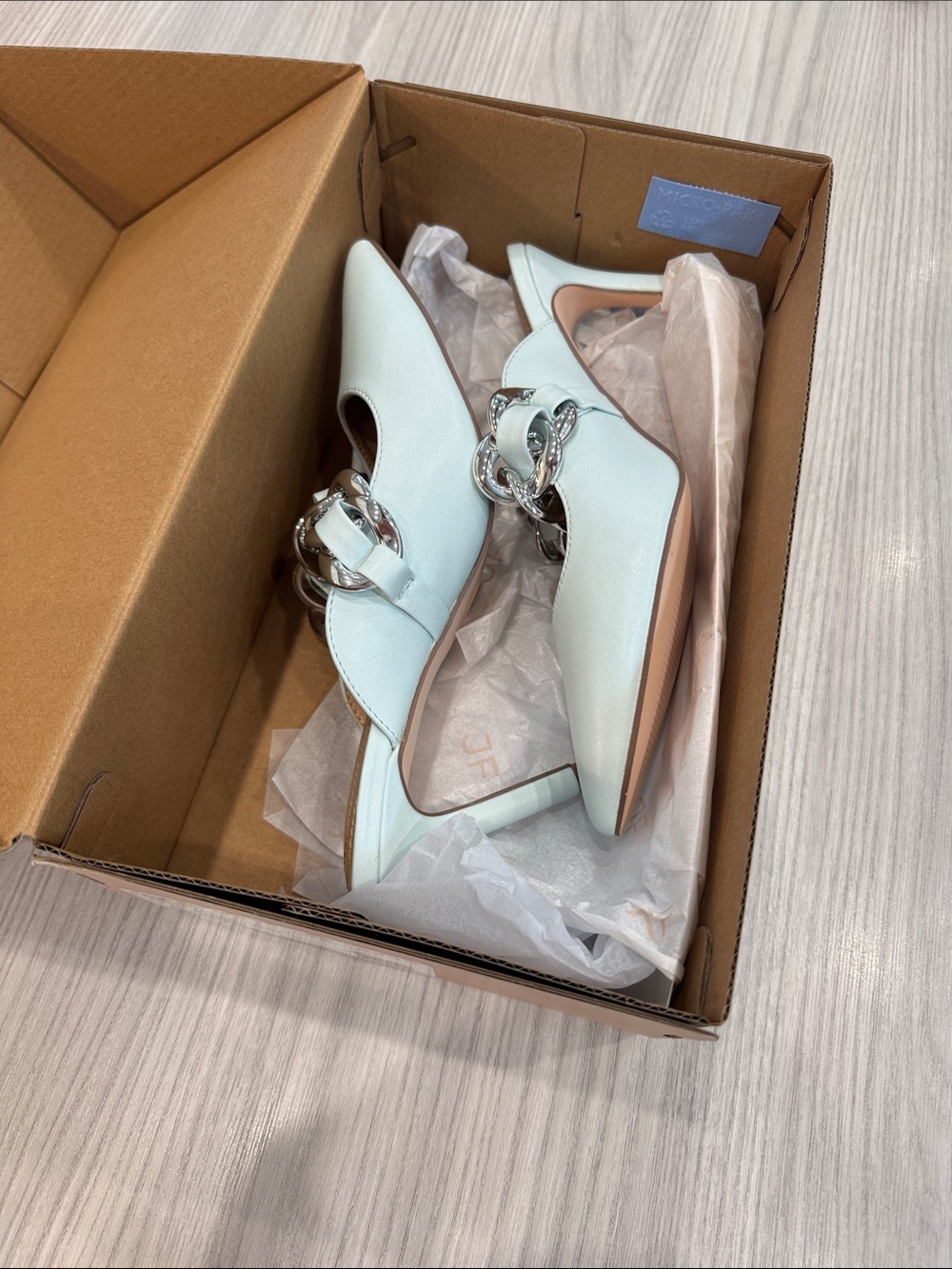 Elegant Light Blue Pointed Toe Heels with Chain Accent